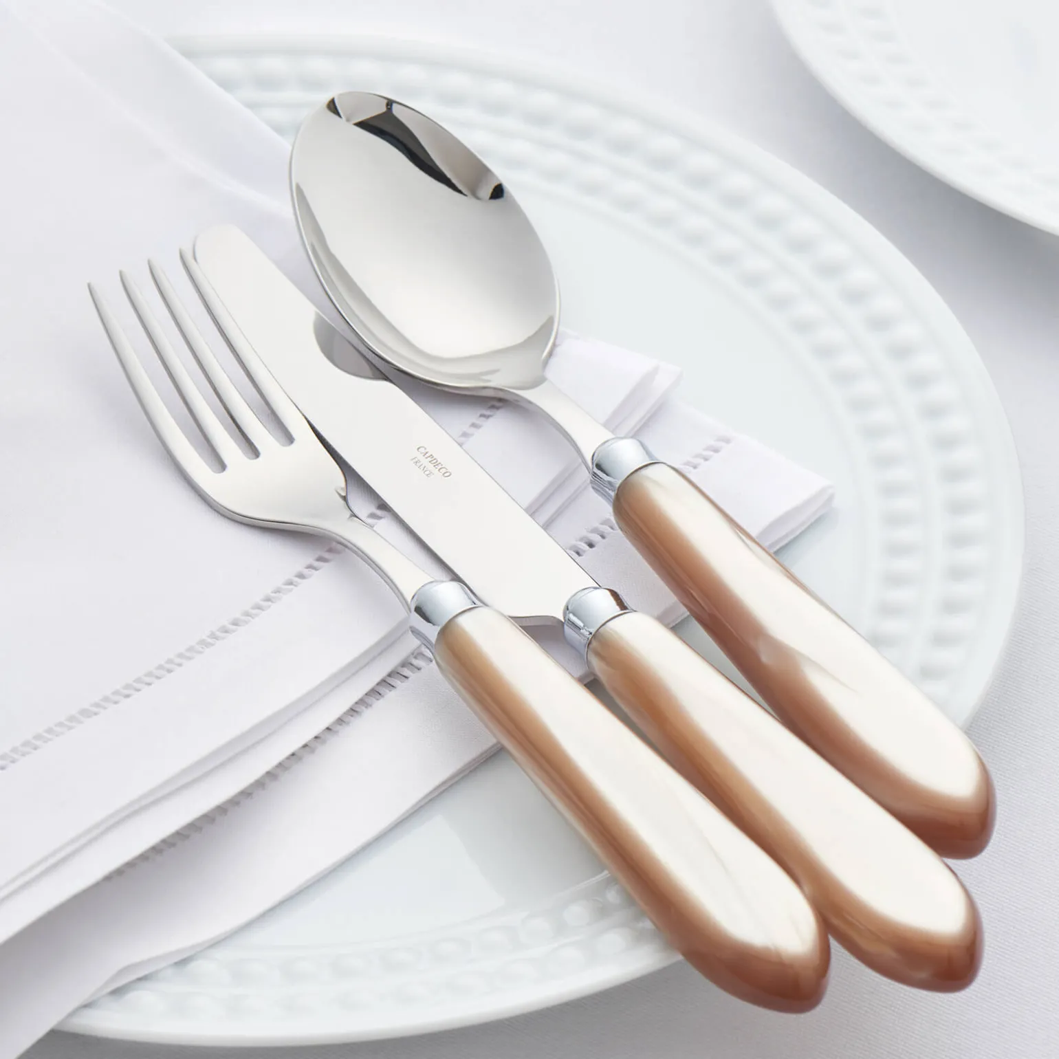 omega_horn_piece_cutlery__1.webp Omega Horn 4-Piece Cutlery Set