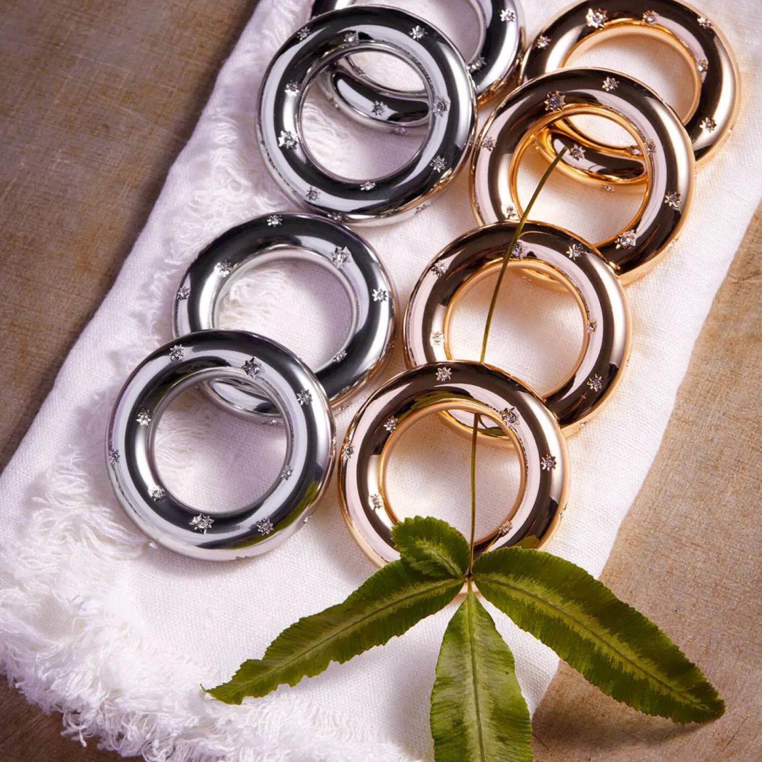 stars_platinum_napkin_rin_1.webp Stars Platinum Napkin Ring - Set of 4